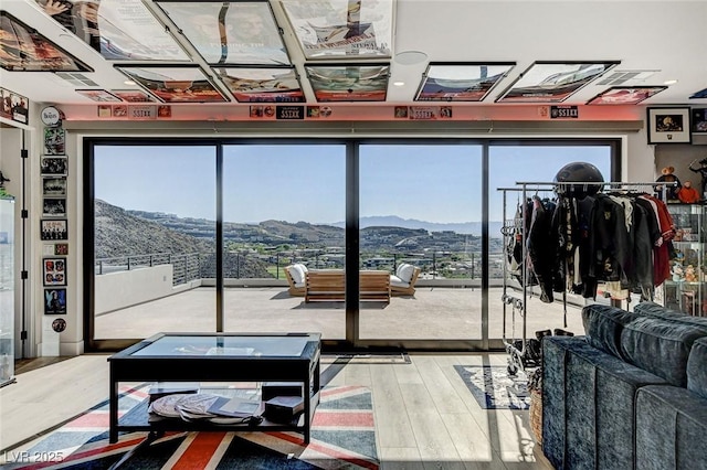 527 Serenity Point Dr, Henderson, NV 89012 - living area with a mountain view and wood finished floors