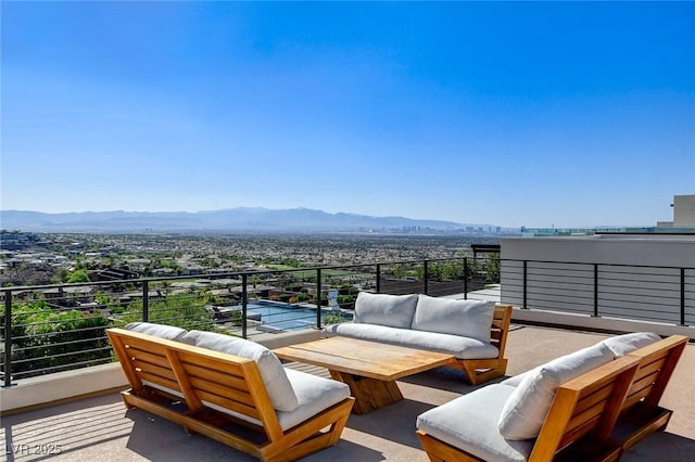 527 Serenity Point Dr, Henderson, NV 89012 - balcony featuring an outdoor living space and a mountain view
