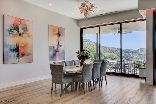 527 Serenity Point Dr, Henderson, NV 89012 - dining room featuring light wood-type flooring, a ceiling fan, and recessed lighting