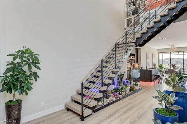 527 Serenity Point Dr, Henderson, NV 89012 - staircase with wood finished floors and recessed lighting