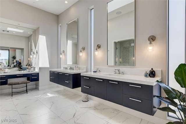 527 Serenity Point Dr, Henderson, NV 89012 - full bath featuring two vanities and marble finish flooring
