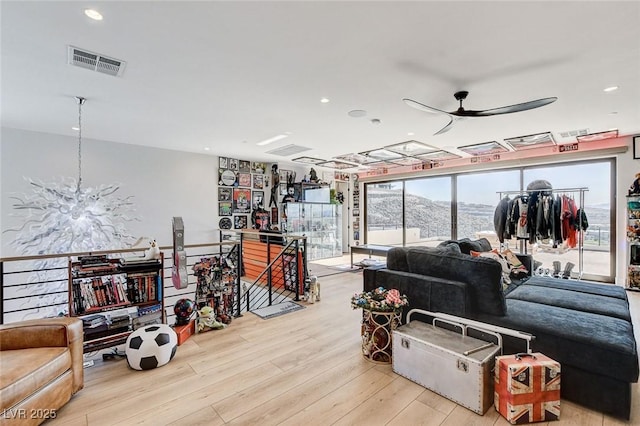 527 Serenity Point Dr, Henderson, NV 89012 - living area with wood finished floors, ceiling fan, and recessed lighting