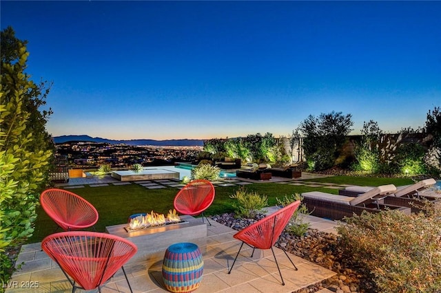 527 Serenity Point Dr, Henderson, NV 89012 - view of patio / terrace featuring an outdoor fire pit and a mountain view