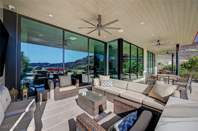 527 Serenity Point Dr, Henderson, NV 89012 - view of patio / terrace with ceiling fan, an outdoor hangout area, and outdoor dining space