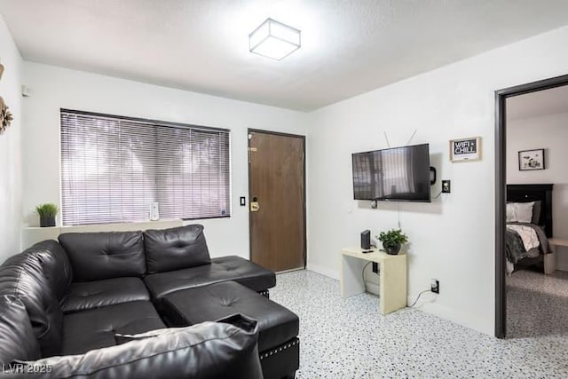 4955 Jeffreys St Unit 605, Las Vegas, NV 89119 - living room featuring speckled floor