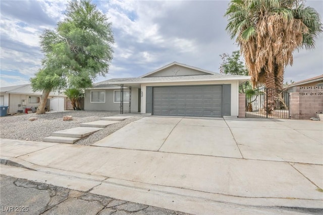 4269 Roanridge Ave, Las Vegas, NV 89120 - single story home with an attached garage, concrete driveway, and stucco siding