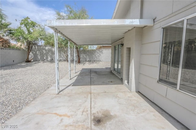 4269 Roanridge Ave, Las Vegas, NV 89120 - fenced backyard featuring an attached carport