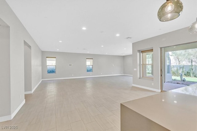 2170 Monte Bianco Pl, Henderson, NV 89044 - unfurnished living room featuring plenty of natural light and recessed lighting