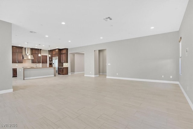 2170 Monte Bianco Pl, Henderson, NV 89044 - unfurnished living room with baseboards and recessed lighting
