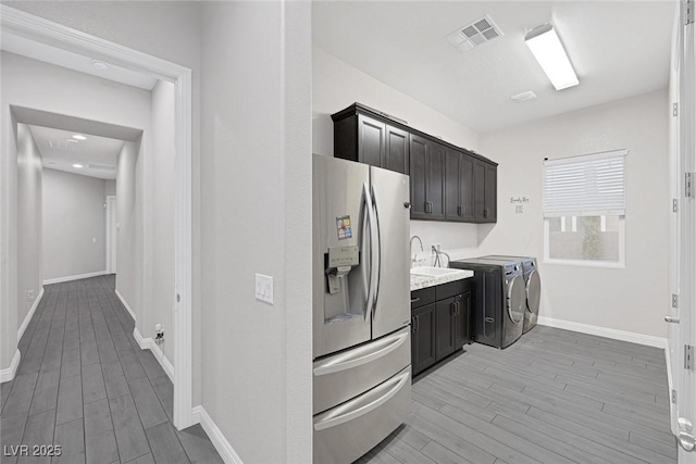 274 Chartan Ave, Las Vegas, NV 89183 - laundry area featuring independent washer and dryer and light wood-type flooring