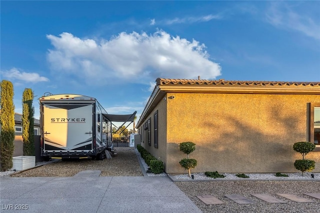 274 Chartan Ave, Las Vegas, NV 89183 - view of property exterior with stucco siding