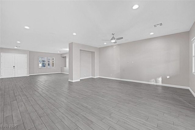 274 Chartan Ave, Las Vegas, NV 89183 - unfurnished living room featuring a ceiling fan, wood finished floors, and recessed lighting