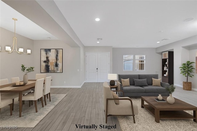 274 Chartan Ave, Las Vegas, NV 89183 - living room with light wood-style flooring, a chandelier, and recessed lighting
