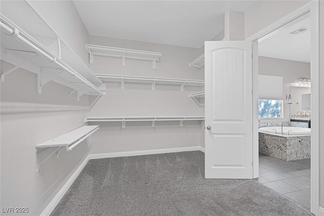 274 Chartan Ave, Las Vegas, NV 89183 - spacious closet with carpet flooring