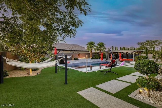274 Chartan Ave, Las Vegas, NV 89183 - view of property's community with a pool and a patio area