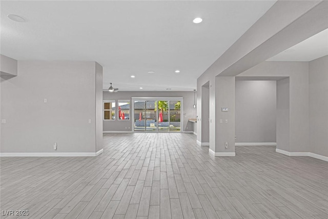 274 Chartan Ave, Las Vegas, NV 89183 - unfurnished living room with light wood-type flooring, ceiling fan, and recessed lighting