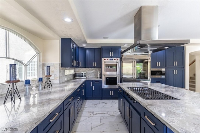 11005 Inverlochy Ct, Las Vegas, NV 89141 - kitchen featuring stainless steel appliances, island exhaust hood, blue cabinetry, light marble finish floors, and recessed lighting