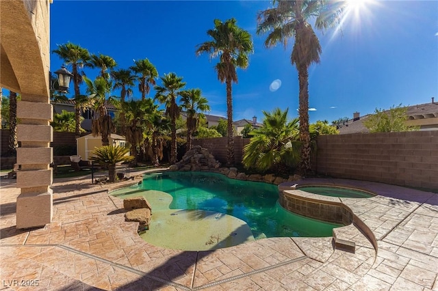 11005 Inverlochy Ct, Las Vegas, NV 89141 - view of swimming pool with a patio, a pool with connected hot tub, and a fenced backyard