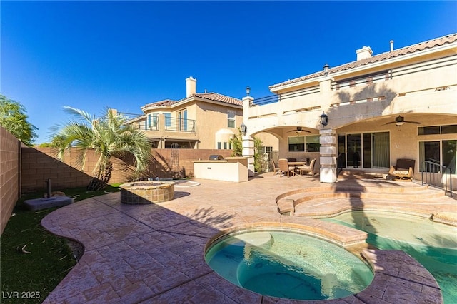 11005 Inverlochy Ct, Las Vegas, NV 89141 - view of pool featuring a ceiling fan, a fenced backyard, and a patio