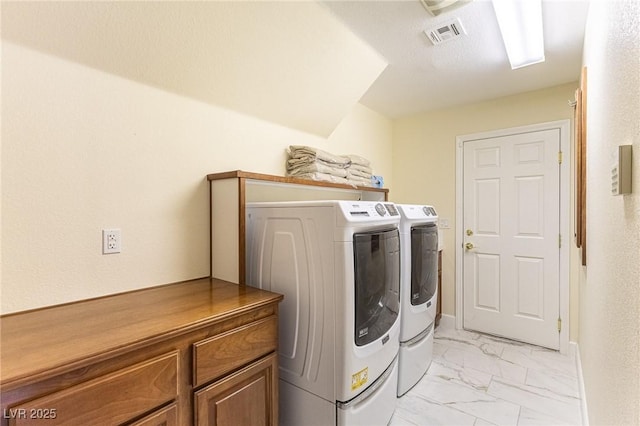 11005 Inverlochy Ct, Las Vegas, NV 89141 - washroom with washing machine and dryer, light marble finish flooring, and cabinet space
