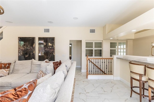 11005 Inverlochy Ct, Las Vegas, NV 89141 - living room featuring marble look tiles and baseboards