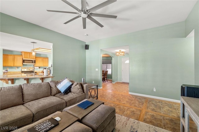 231 Bristle Cone, Pahrump, NV 89048 - living area featuring arched walkways and a ceiling fan