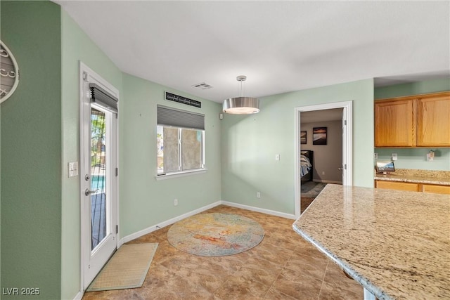 231 Bristle Cone, Pahrump, NV 89048 - unfurnished dining area with baseboards