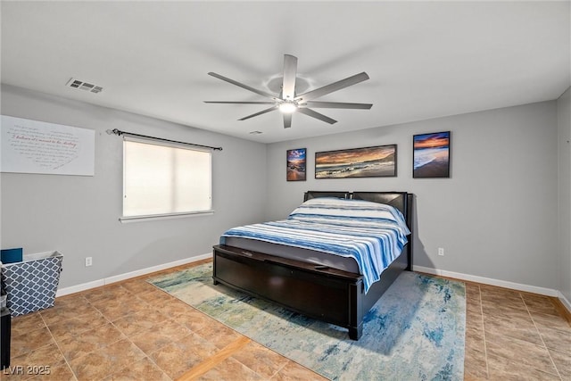 231 Bristle Cone, Pahrump, NV 89048 - tiled bedroom featuring baseboards and ceiling fan