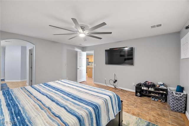 231 Bristle Cone, Pahrump, NV 89048 - bedroom featuring arched walkways and a ceiling fan