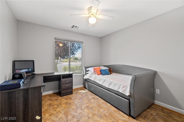 231 Bristle Cone, Pahrump, NV 89048 - bedroom featuring a ceiling fan and light stone finish floors