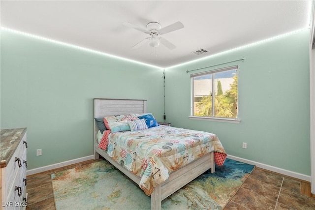 231 Bristle Cone, Pahrump, NV 89048 - bedroom featuring baseboards and a ceiling fan