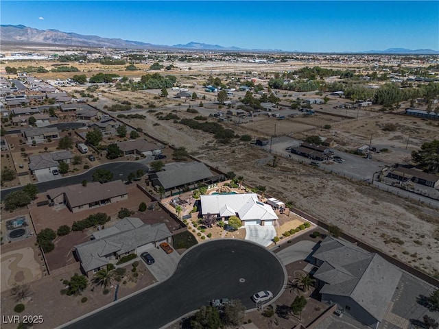 231 Bristle Cone, Pahrump, NV 89048 - aerial overview of property's location featuring mountains and nearby suburban area