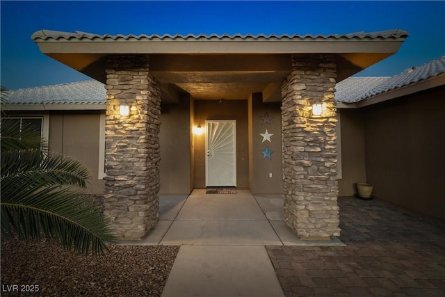 231 Bristle Cone, Pahrump, NV 89048 - entrance to property featuring stucco siding and stone siding