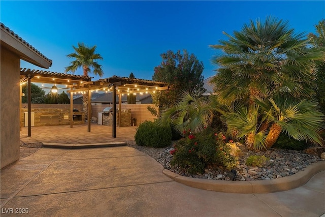 231 Bristle Cone, Pahrump, NV 89048 - view of patio / terrace featuring an outdoor kitchen and a pergola