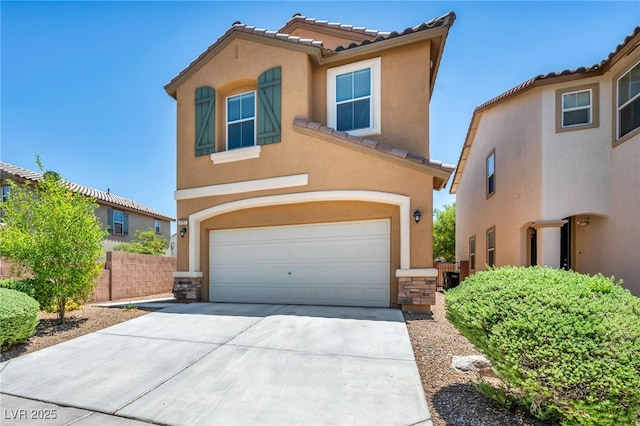 3757 Via Geneva, Henderson, NV 89052 - view of front of property with an attached garage, stucco siding, concrete driveway, and a tile roof