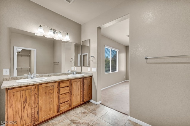 3757 Via Geneva, Henderson, NV 89052 - full bathroom with double vanity, tile patterned floors, and a textured wall