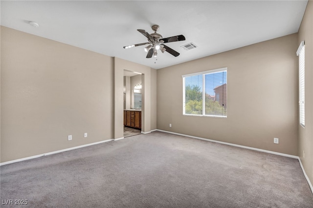 3757 Via Geneva, Henderson, NV 89052 - unfurnished room featuring plenty of natural light, a ceiling fan, and light carpet