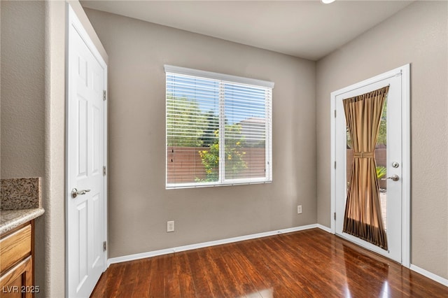 3757 Via Geneva, Henderson, NV 89052 - foyer entrance with dark wood-style flooring and baseboards
