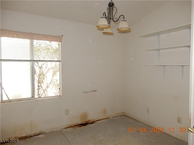 8151 Chambersberg St, Las Vegas, NV 89147 - unfurnished room featuring plenty of natural light and a chandelier