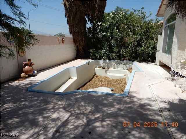8151 Chambersberg St, Las Vegas, NV 89147 - view of storm shelter with a patio