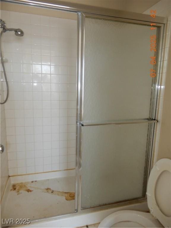 8151 Chambersberg St, Las Vegas, NV 89147 - bathroom featuring toilet and a shower stall