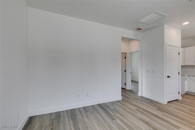 367 N 16th St, Las Vegas, NV 89101 - empty room featuring light wood-style flooring and recessed lighting