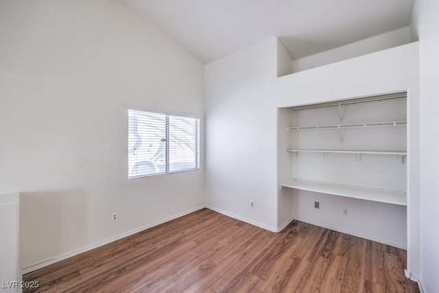 4010 Hemphill St, North Las Vegas, NV 89032 - unfurnished office featuring wood finished floors and high vaulted ceiling