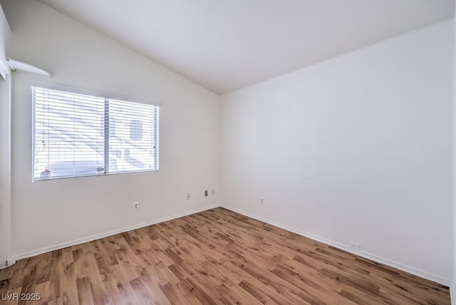4010 Hemphill St, North Las Vegas, NV 89032 - empty room with vaulted ceiling and light wood-type flooring