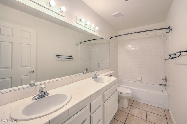 4010 Hemphill St, North Las Vegas, NV 89032 - full bathroom featuring double vanity,  shower combination, and tile patterned floors