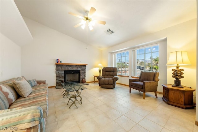2040 Tucuman Ave, Pahrump, NV 89048 - living area with a ceiling fan, a stone fireplace, and high vaulted ceiling