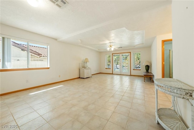 2040 Tucuman Ave, Pahrump, NV 89048 - empty room with light tile patterned floors and a ceiling fan