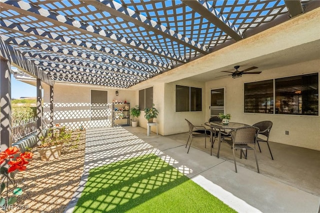 2040 Tucuman Ave, Pahrump, NV 89048 - view of patio featuring a ceiling fan, a pergola, and outdoor dining area