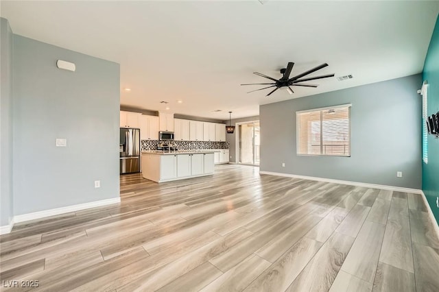 5990 Viscaya Grove St, Las Vegas, NV 89118 - unfurnished living room with a ceiling fan, light wood-type flooring, and recessed lighting