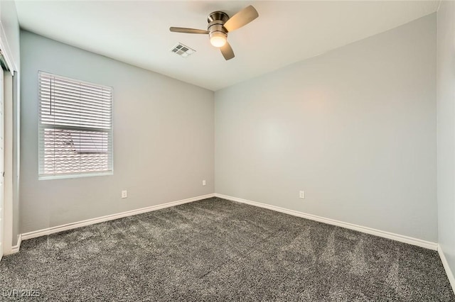 5990 Viscaya Grove St, Las Vegas, NV 89118 - spare room featuring dark colored carpet and a ceiling fan